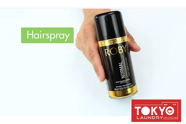cách tẩy vết mực trên áo bằng keo xịt tóc