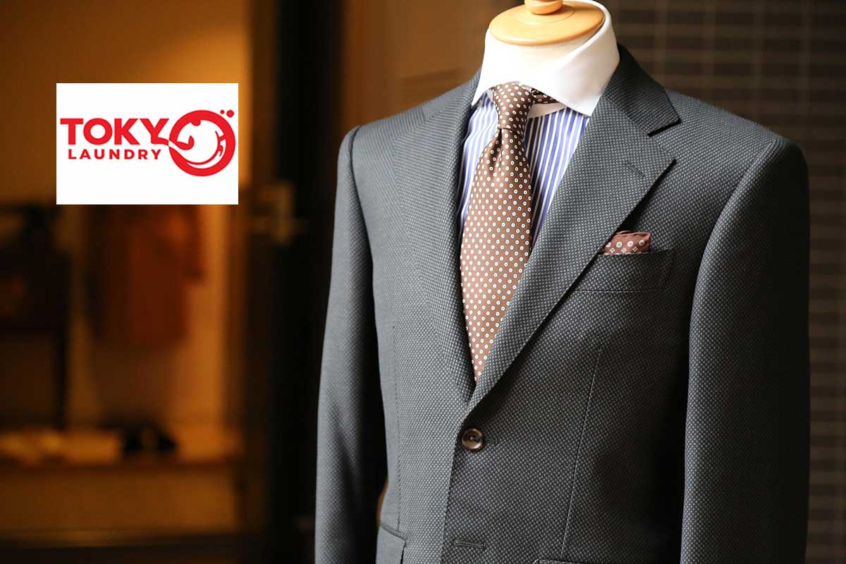 Dịch vụ giặt áo vest tại Trương Định giúp giữ chuẩn form dáng áo vest công sở màu xám
